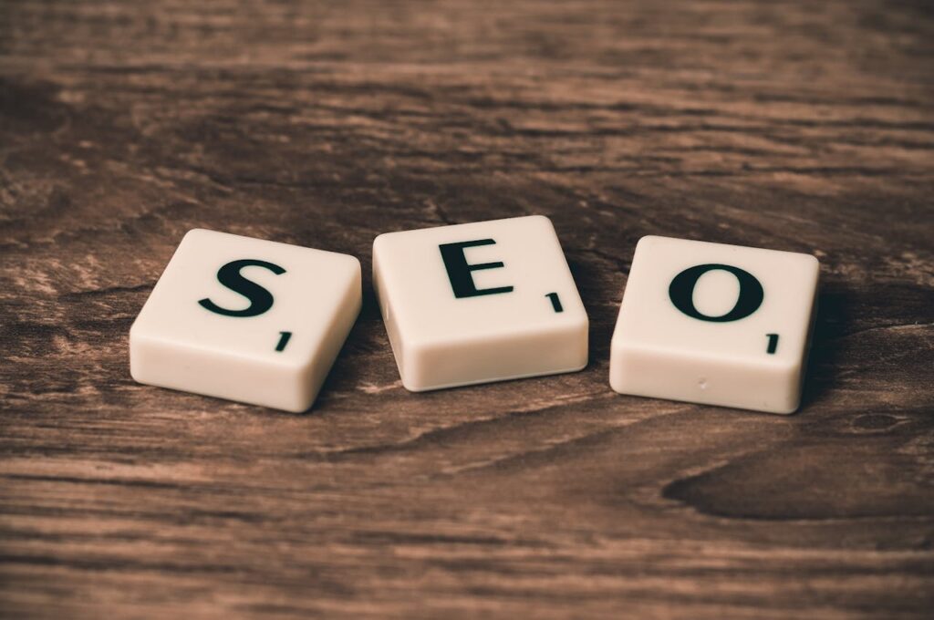 pexels-photo-270637 Scrabble tiles spelling 'SEO' on a wooden surface. Ideal for digital marketing themes.